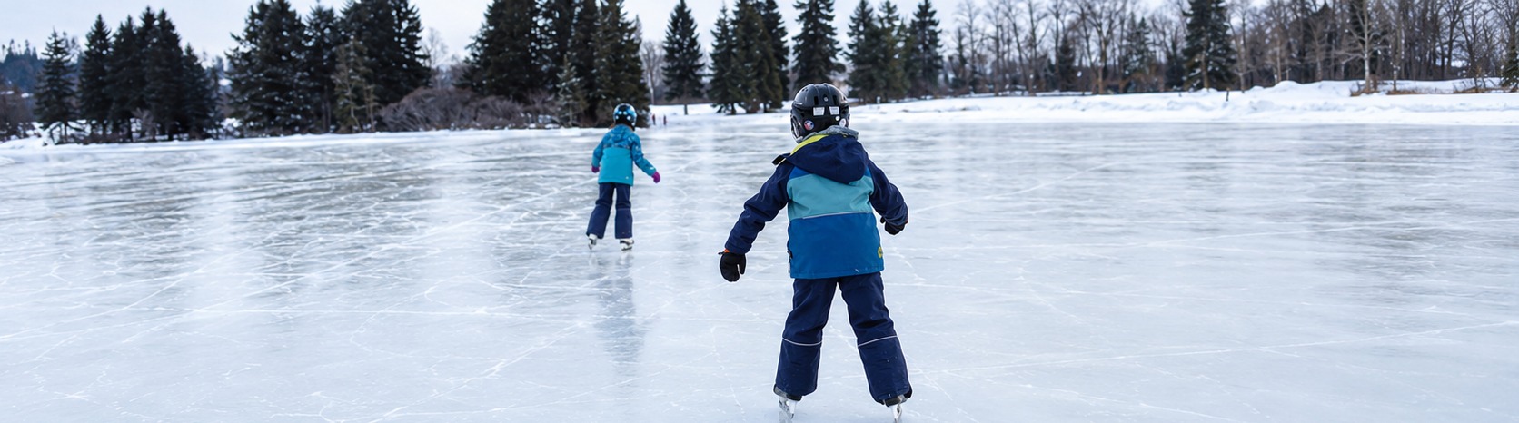 Children skating on the outdoor rink at KickStart Skating